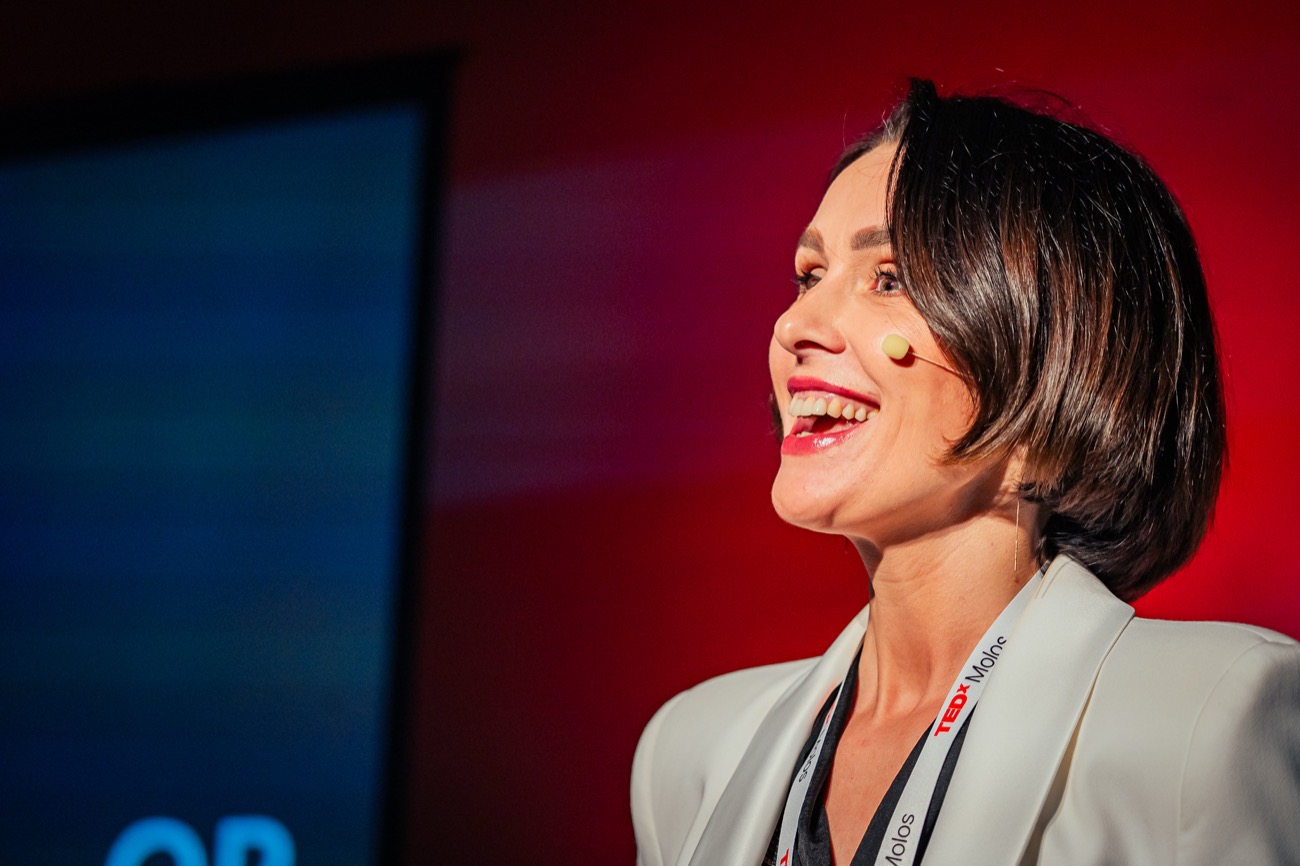 Natallia on the TEDx stage, close up